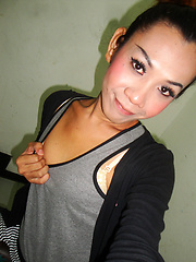 Ladyboy Nam upskirt cock peeks and cute pigtails
