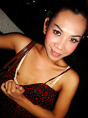 Ladyboy Nam upskirt cock peeks and cute pigtails